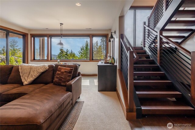 40 Eagle Ridge Dr, Cle Elum, WA 98922 - carpeted living area with stairway, plenty of natural light, baseboards, and recessed lighting