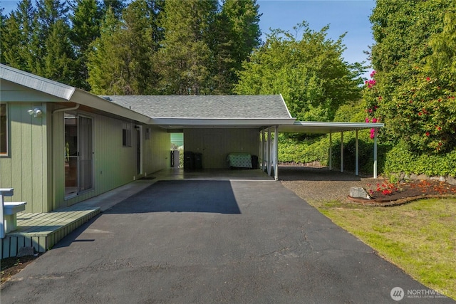 4414 Merlie Ave NE, Bremerton, WA 98310 - view of parking with driveway and a carport