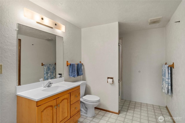 4414 Merlie Ave NE, Bremerton, WA 98310 - bathroom featuring tile patterned floors, vanity, a textured ceiling, toilet, and a shower