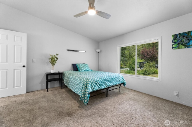 16037 Vail Loop Rd SE, Rainier, WA 98576 - carpeted bedroom featuring lofted ceiling and ceiling fan