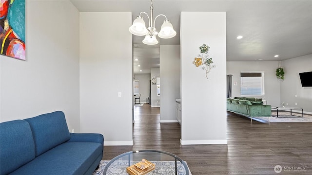 207 Clayton Pl, Mattawa, WA 99349 - living room with a chandelier, wood finished floors, baseboards, and recessed lighting
