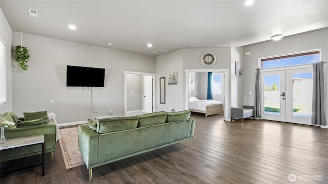 207 Clayton Pl, Mattawa, WA 99349 - living area with french doors, wood finished floors, baseboards, and recessed lighting