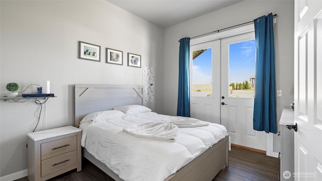 207 Clayton Pl, Mattawa, WA 99349 - bedroom with dark wood-style floors, access to outside, and baseboards