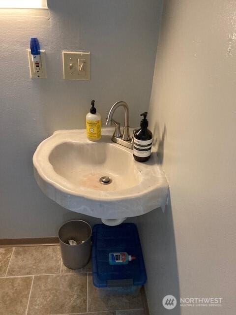 161 N Schoolhouse Hill Rd, Hoodsport, WA 98548 - bathroom with a sink and tile patterned flooring