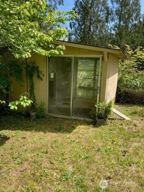 161 N Schoolhouse Hill Rd, Hoodsport, WA 98548 - view of outbuilding featuring a sunroom