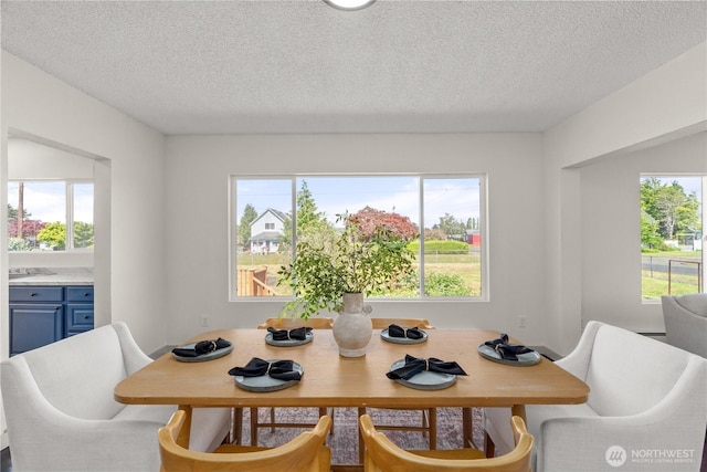 506 G St, Cosmopolis, WA 98537 - dining space featuring a textured ceiling