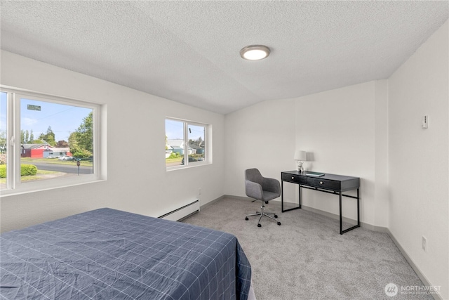 506 G St, Cosmopolis, WA 98537 - bedroom featuring a baseboard heating unit, carpet flooring, a textured ceiling, and baseboards