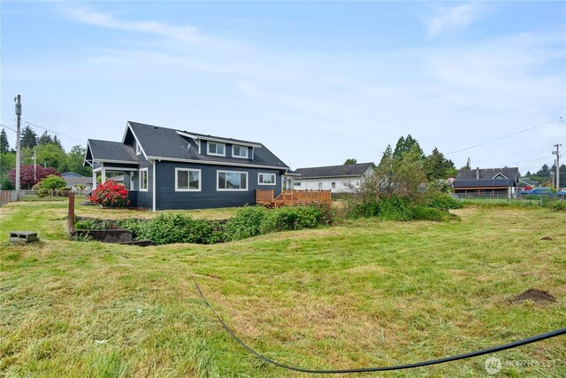 506 G St, Cosmopolis, WA 98537 - view of front of home featuring a front yard and a deck