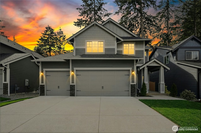 16636 8th Avenue Ct E Unit 05, Spanaway, WA 98387 - craftsman-style house with driveway, stone siding, board and batten siding, an attached garage, and a shingled roof