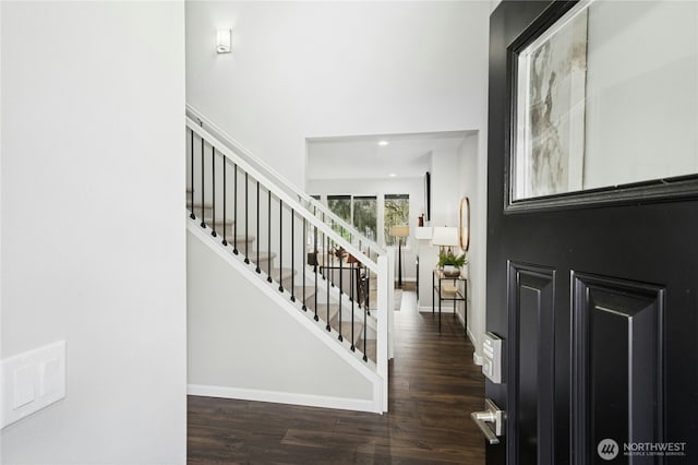 16636 8th Avenue Ct E Unit 05, Spanaway, WA 98387 - entryway with wood finished floors, stairway, baseboards, and recessed lighting