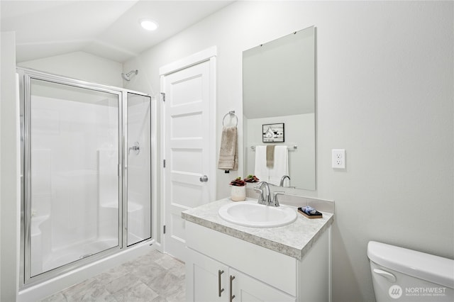 16636 8th Avenue Ct E Unit 05, Spanaway, WA 98387 - full bathroom featuring a shower stall, toilet, vanity, and lofted ceiling