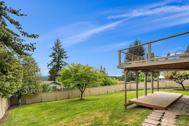 view of yard featuring a deck