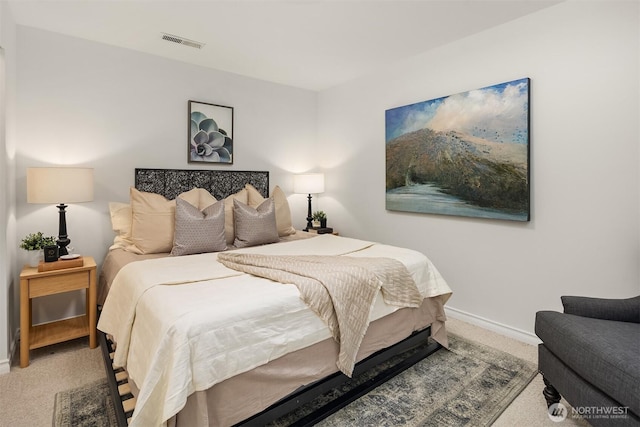 carpeted bedroom featuring baseboards