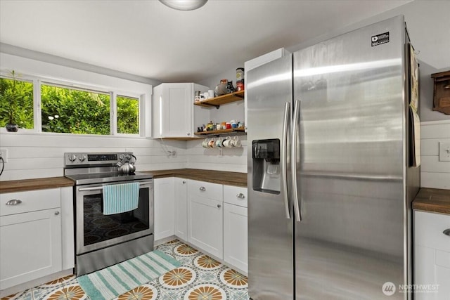 304 Riverview Dr NE, Auburn, WA 98002 - kitchen featuring stainless steel appliances, butcher block counters, open shelves, white cabinets, and light tile patterned flooring