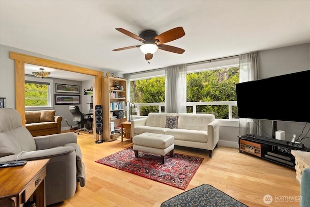 304 Riverview Dr NE, Auburn, WA 98002 - living room with ceiling fan and wood finished floors