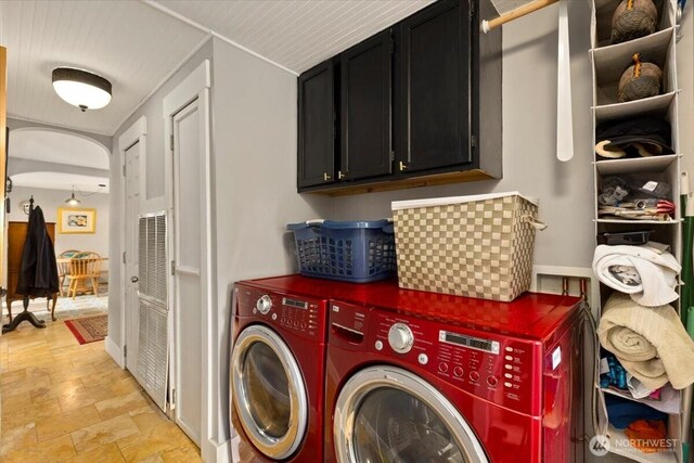 304 Riverview Dr NE, Auburn, WA 98002 - laundry room featuring cabinet space, independent washer and dryer, and stone finish flooring