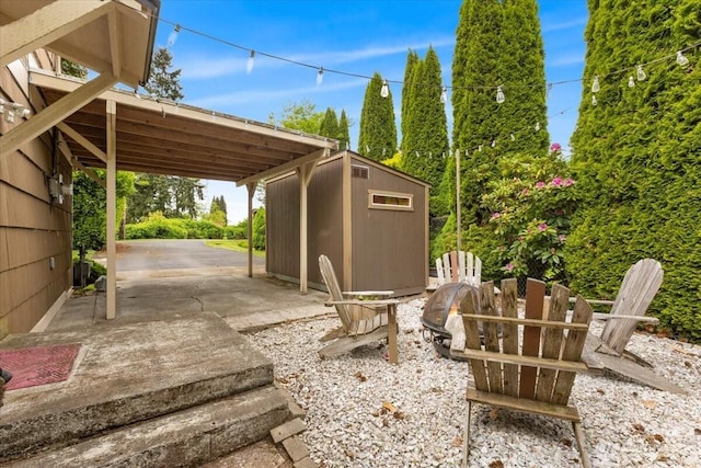 304 Riverview Dr NE, Auburn, WA 98002 - view of patio featuring a storage shed and an outdoor structure