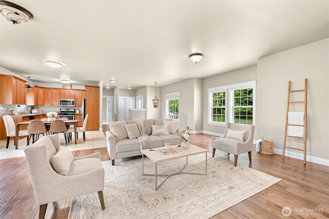 2225 Old Lakeway Dr, Bellingham, WA 98229 - living room featuring light wood-style floors and baseboards
