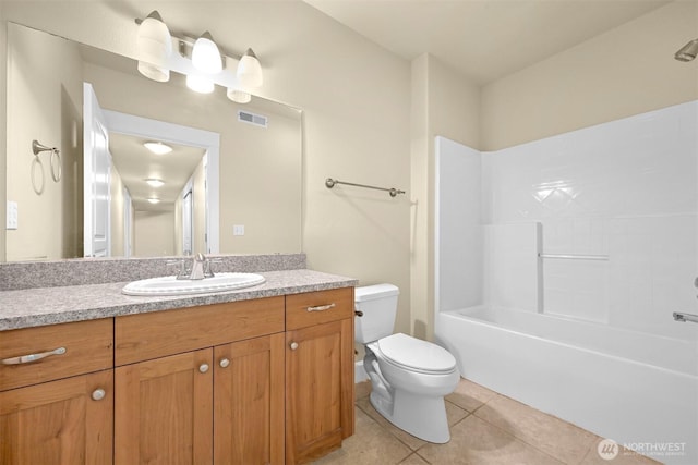 2225 Old Lakeway Dr, Bellingham, WA 98229 - bathroom featuring tile patterned floors, toilet, vanity, and shower / washtub combination