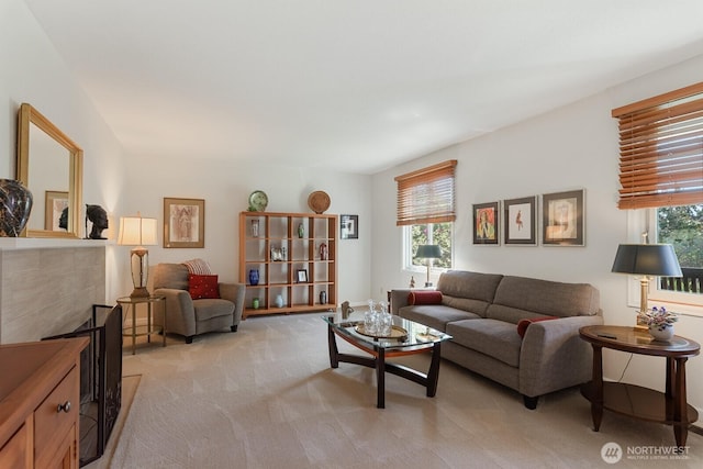 living area with light colored carpet