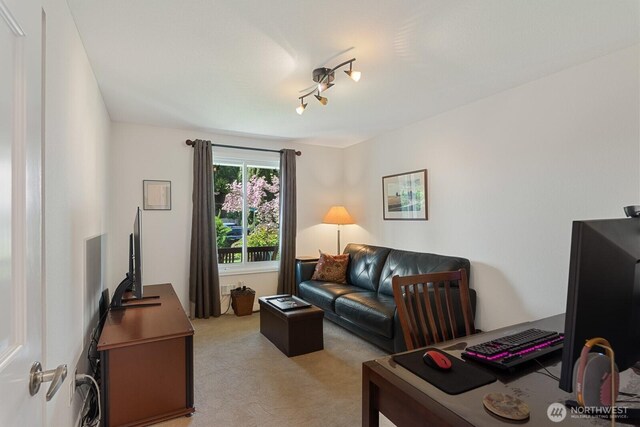 living room featuring light colored carpet