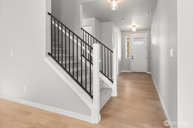 7332 284th St NW, Stanwood, WA 98292 - foyer featuring wood finished floors and stairway