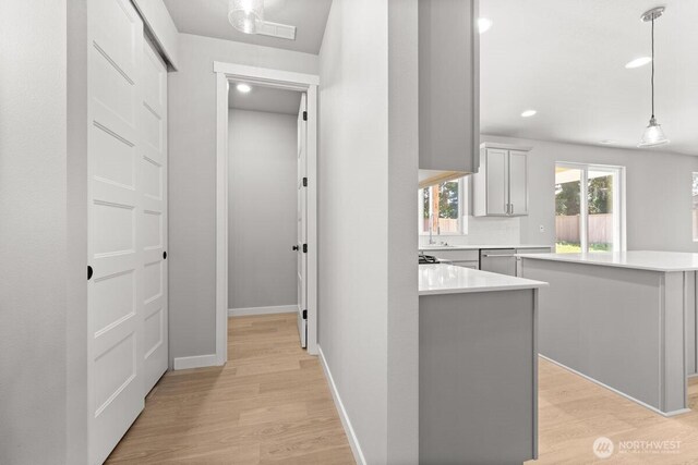 7332 284th St NW, Stanwood, WA 98292 - hallway featuring light wood-style floors and recessed lighting