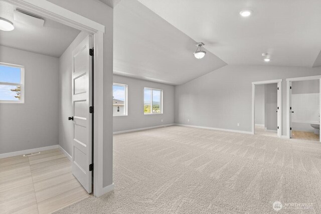 7332 284th St NW, Stanwood, WA 98292 - additional living space with lofted ceiling and light colored carpet