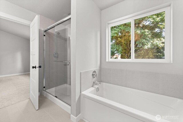 7332 284th St NW, Stanwood, WA 98292 - full bathroom with a shower stall, a bath, and tile patterned floors