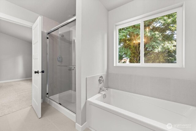 7332 284th St NW, Stanwood, WA 98292 - bathroom featuring a stall shower, a garden tub, and tile patterned flooring