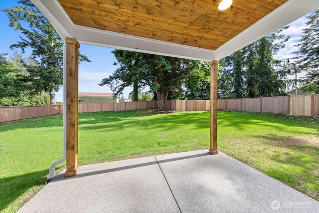 7332 284th St NW, Stanwood, WA 98292 - fenced backyard featuring a patio