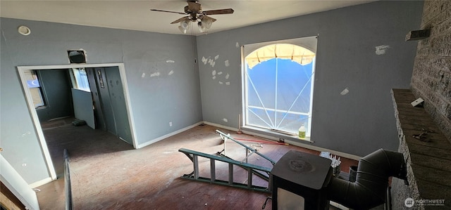 202 W 2nd Ave, Odessa, WA 99159 - interior space featuring healthy amount of natural light, a ceiling fan, and baseboards