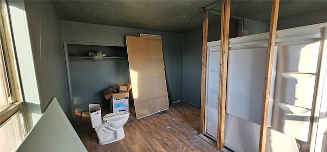202 W 2nd Ave, Odessa, WA 99159 - miscellaneous room featuring wood finished floors and a textured ceiling
