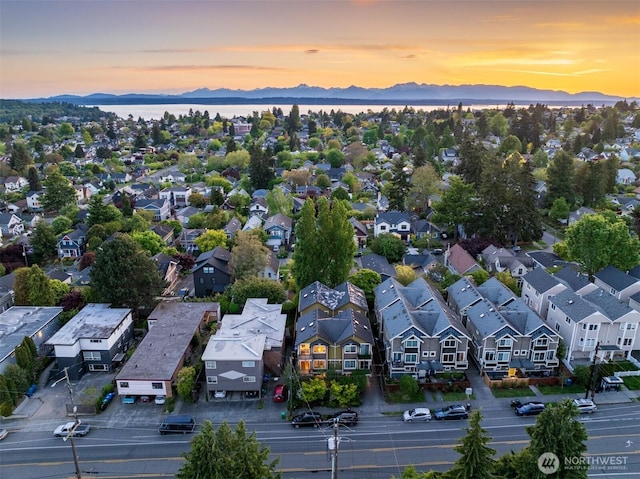 aerial perspective of suburban area featuring a mountainous background