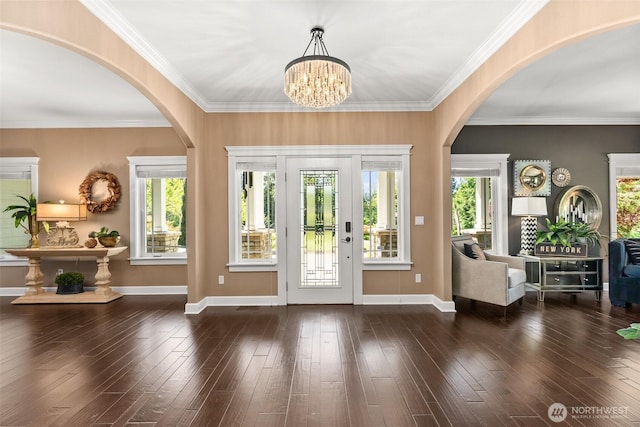 3237 Gravelly Beach Loop NW, Olympia, WA 98502 - entrance foyer featuring arched walkways, plenty of natural light, a chandelier, and ornamental molding