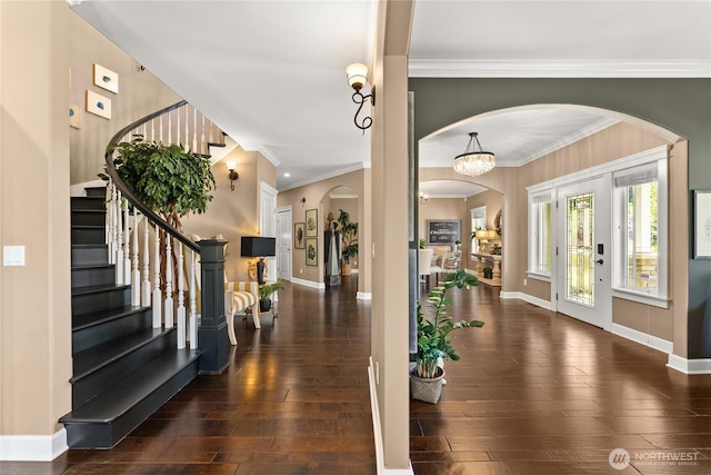 3237 Gravelly Beach Loop NW, Olympia, WA 98502 - foyer entrance featuring arched walkways, stairs, hardwood / wood-style flooring, baseboards, and ornamental molding