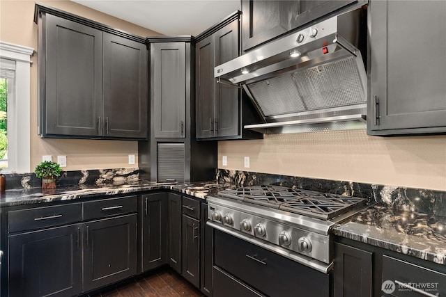 3237 Gravelly Beach Loop NW, Olympia, WA 98502 - kitchen with range hood, stainless steel gas stovetop, dark wood-type flooring, and dark stone countertops