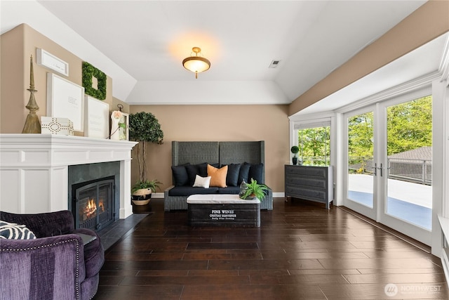 3237 Gravelly Beach Loop NW, Olympia, WA 98502 - living room with a fireplace with flush hearth, lofted ceiling, hardwood / wood-style flooring, and baseboards