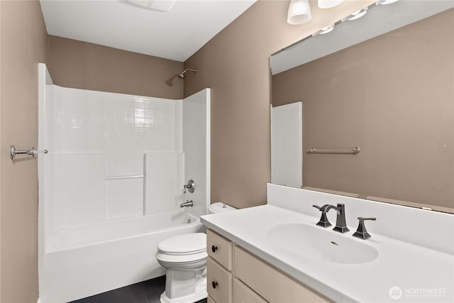 3237 Gravelly Beach Loop NW, Olympia, WA 98502 - bathroom featuring toilet, vanity, and shower / washtub combination