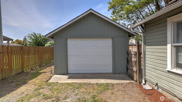 garage featuring fence