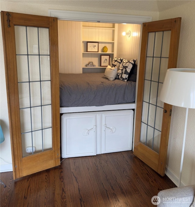 519 W Roy St Unit 309, Seattle, WA 98119 - bedroom with wood finished floors and baseboards