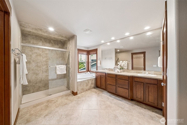 13809 172nd Pl E, Puyallup, WA 98374 - bathroom featuring a garden tub, a stall shower, recessed lighting, double vanity, and tile patterned flooring