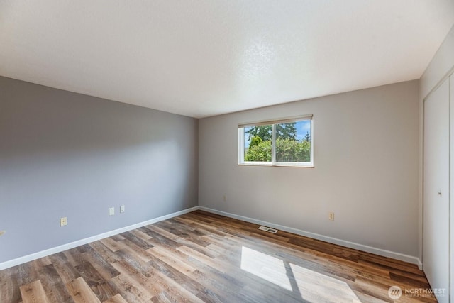 1068 Vista Del Monte, Camano Island, WA 98282 - empty room featuring wood finished floors and baseboards