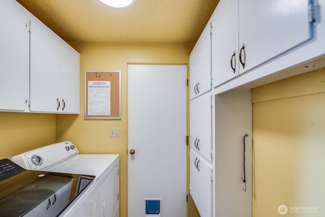 1068 Vista Del Monte, Camano Island, WA 98282 - washroom featuring cabinet space and washing machine and dryer