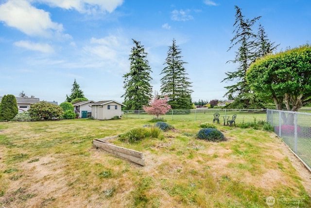 1068 Vista Del Monte, Camano Island, WA 98282 - view of yard with an outdoor structure and a storage unit