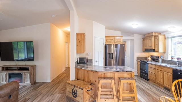 kitchen featuring black range with electric stovetop, stainless steel fridge with ice dispenser, vaulted ceiling, a peninsula, and light wood finished floors