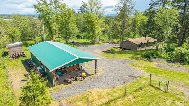 view from above of property with a forest