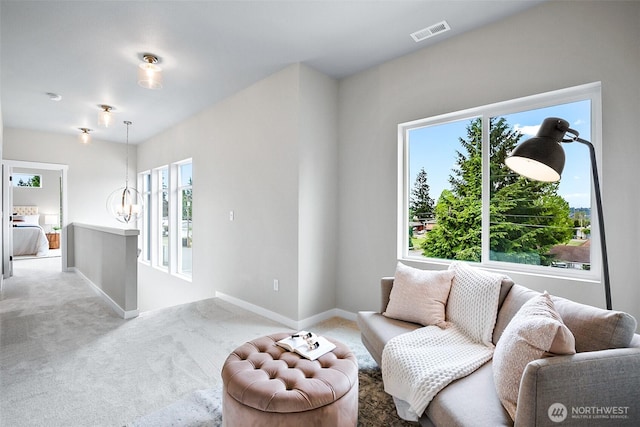 2900 NE 5th Pl, Renton, WA 98056 - carpeted living area with baseboards
