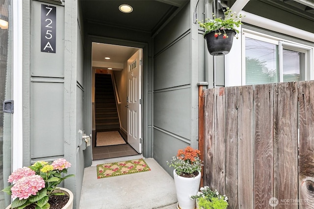 doorway to property with fence