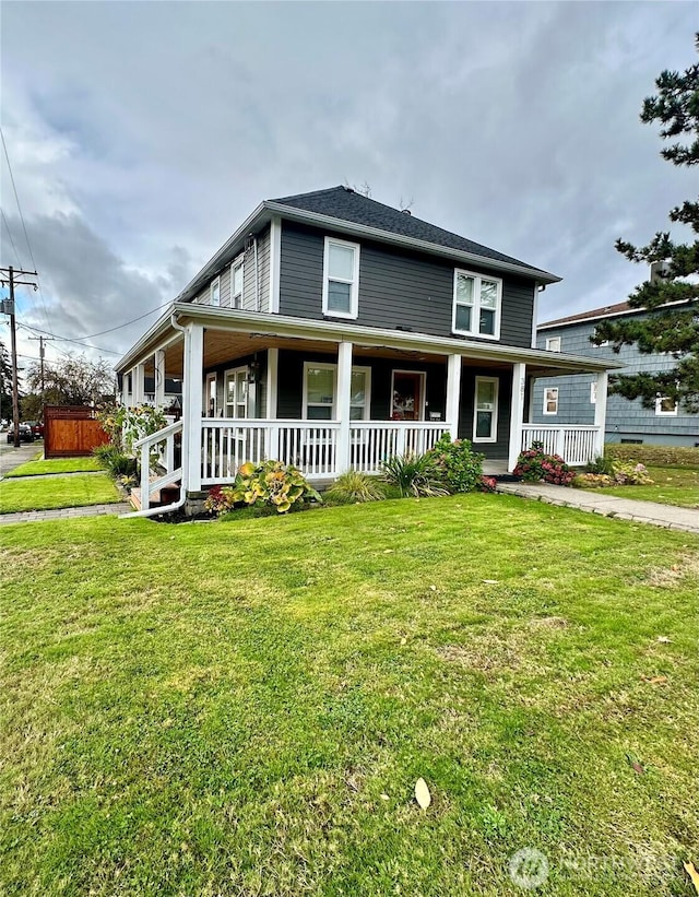 381 S Market Blvd, Chehalis, WA 98532 - view of front facade with a porch and a front lawn